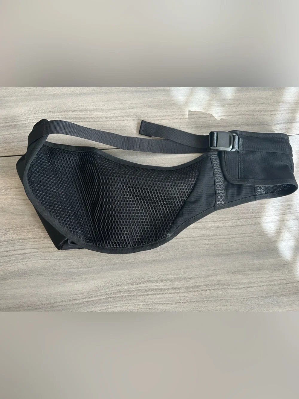 The North Face Black Sling Belt Bag with White Logo